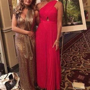 One shoulder strap long red dress.